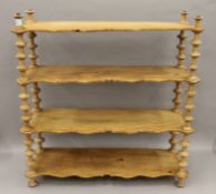 A set of Victorian pine shelves. 64 cm wide.