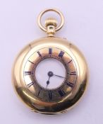 An Edward and Sons 18 ct gold half hunter pocket watch,