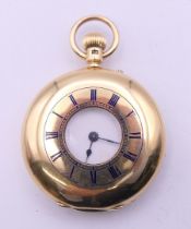 An Edward and Sons 18 ct gold half hunter pocket watch,