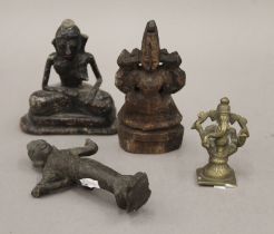 Four various deities. The largest 12 cm high.