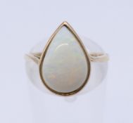 A 9 ct gold and opal ring. Ring size M.