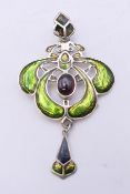 An Art Nouveau style silver pendant. 5.5 cm high.