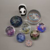A collection of glass paperweights, Caithness and others.