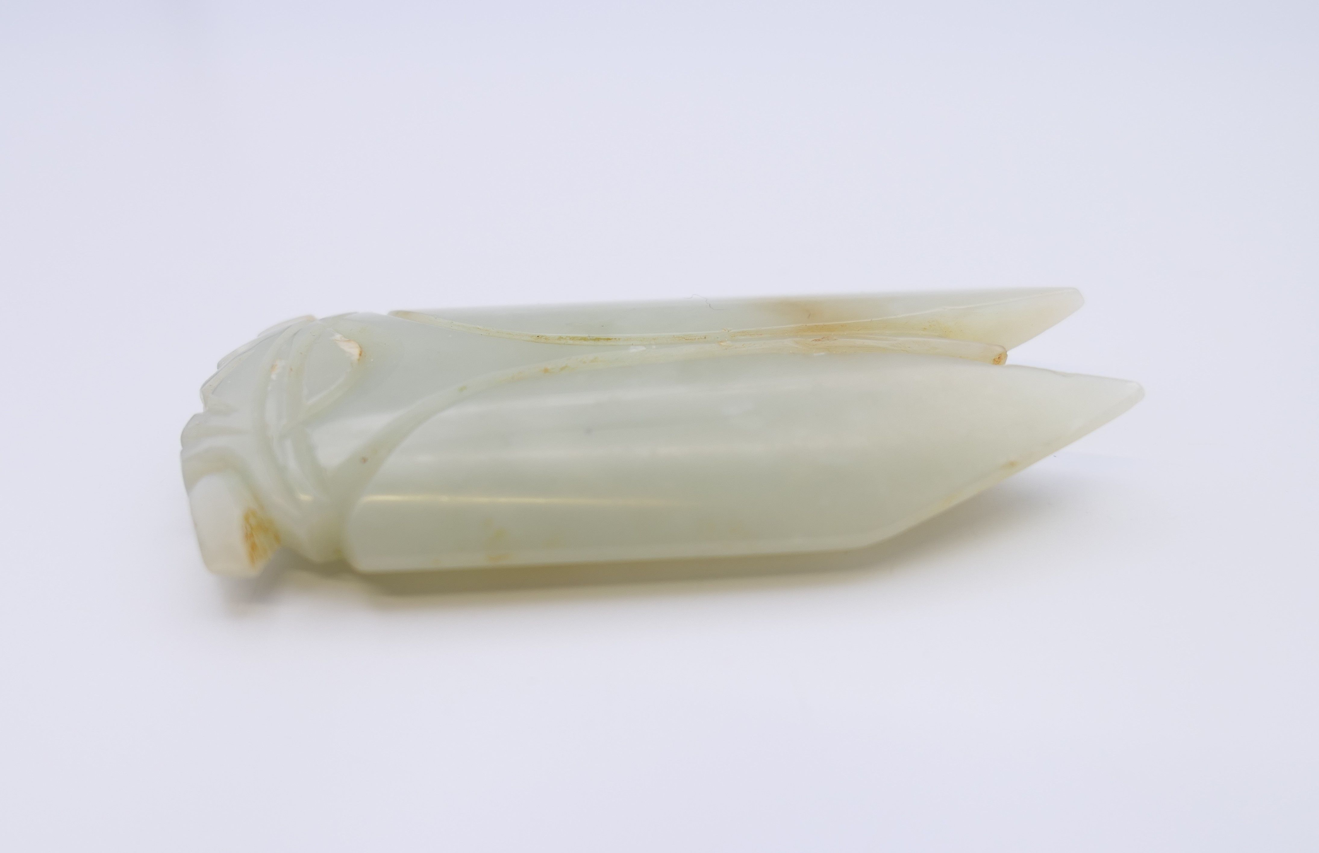 A Chinese light green jade cicada, Han Dynasty. 7 cm long. Provenance: The Larkin/Minney Collection. - Image 2 of 4