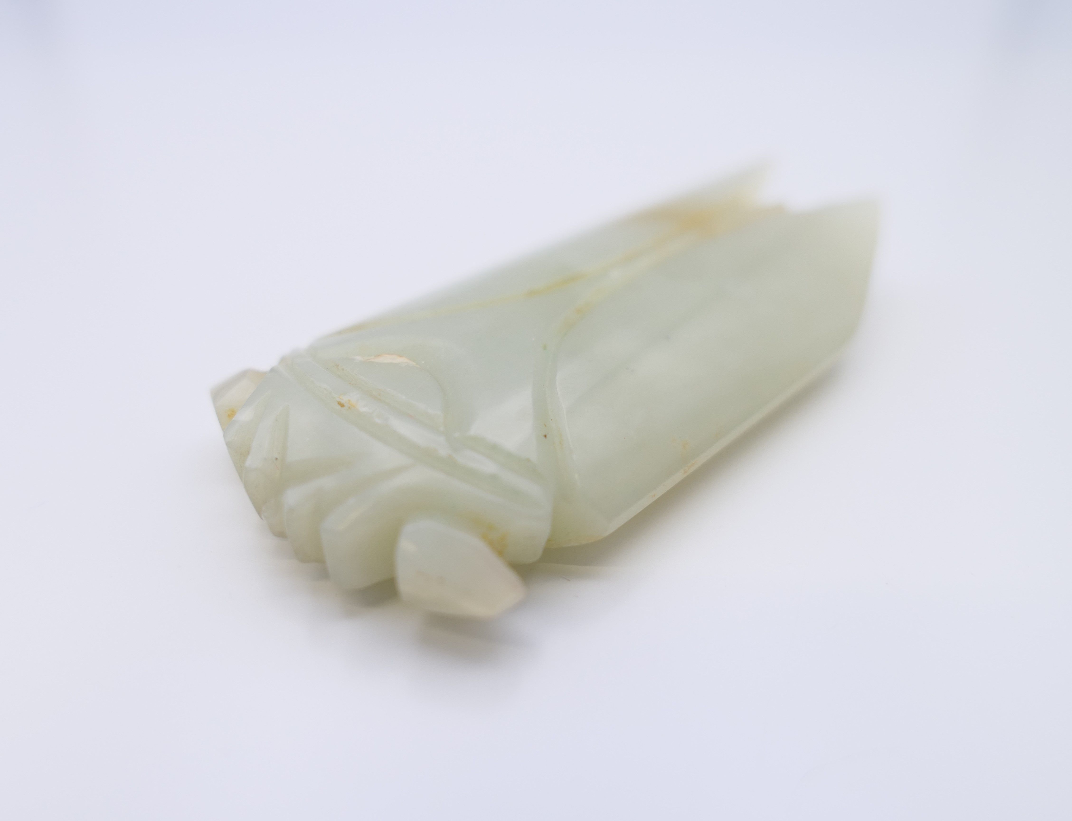 A Chinese light green jade cicada, Han Dynasty. 7 cm long. Provenance: The Larkin/Minney Collection. - Image 4 of 4