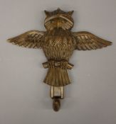 A Blackforest carved owl form articulated coat hook. 25 cm high.