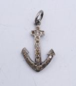 A anchor form charm. 2 cm high.