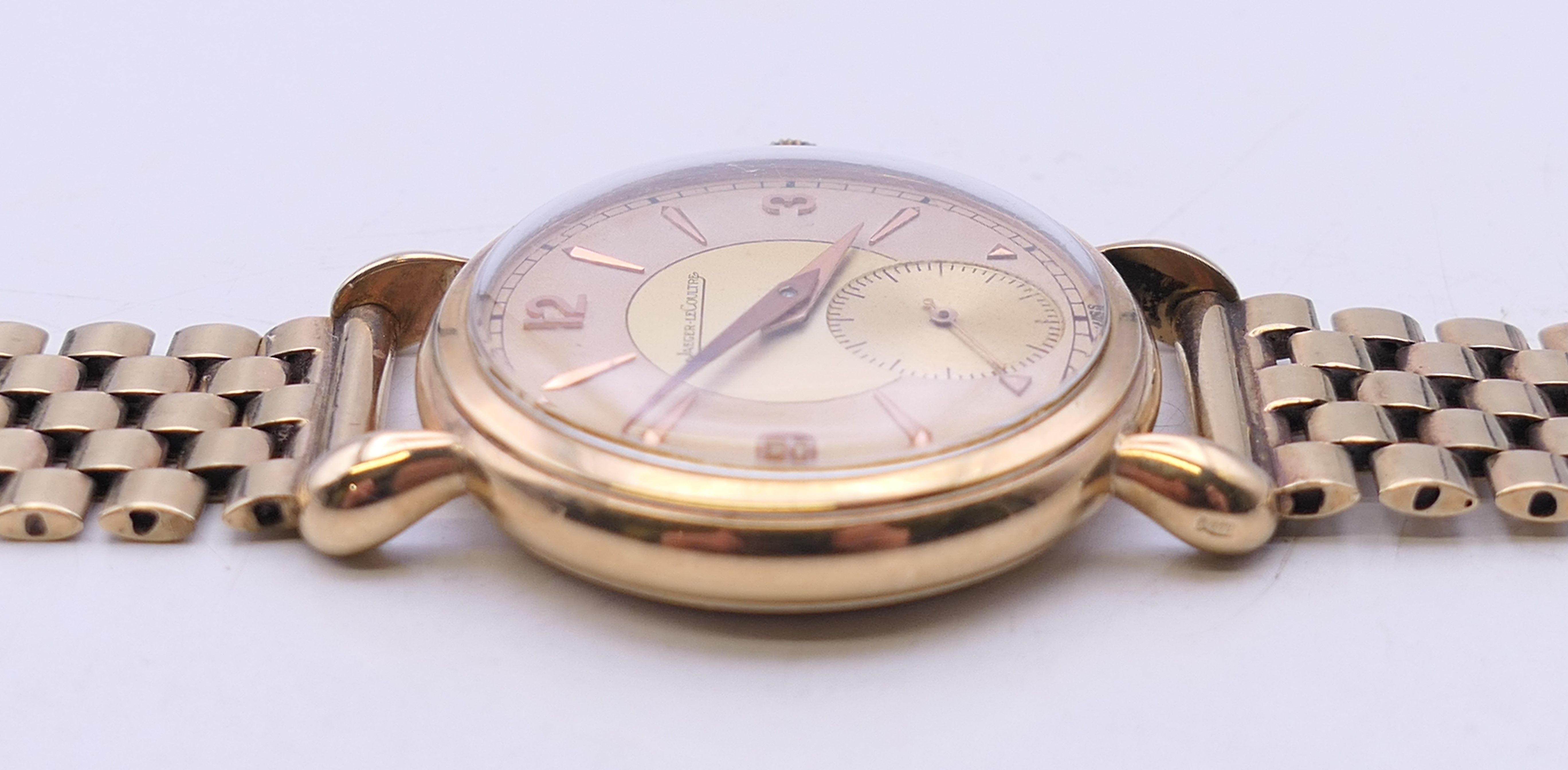 A 9 ct gold Jaeger LeCoultre gentleman's wristwatch. 3.5 cm wide. 52.5 grammes total weight. - Image 7 of 7