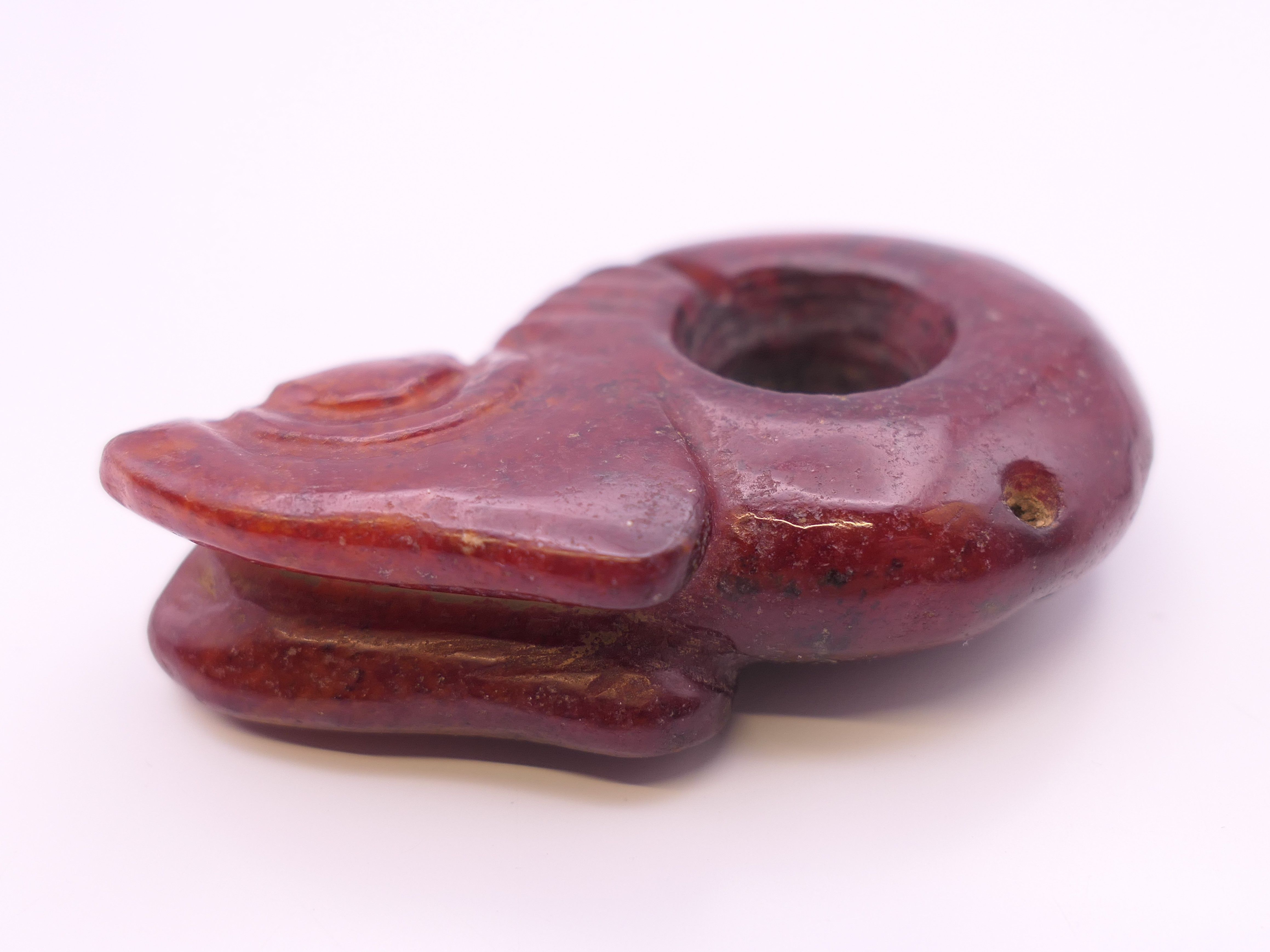 A Chinese red jade pig dragon, early Hongshan Culture. 6 cm long. - Image 3 of 6