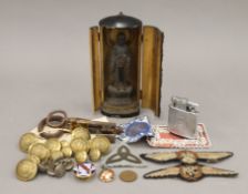 Two antique keys, a travelling shrine, military buttons, etc. The shrine 14 cm high.