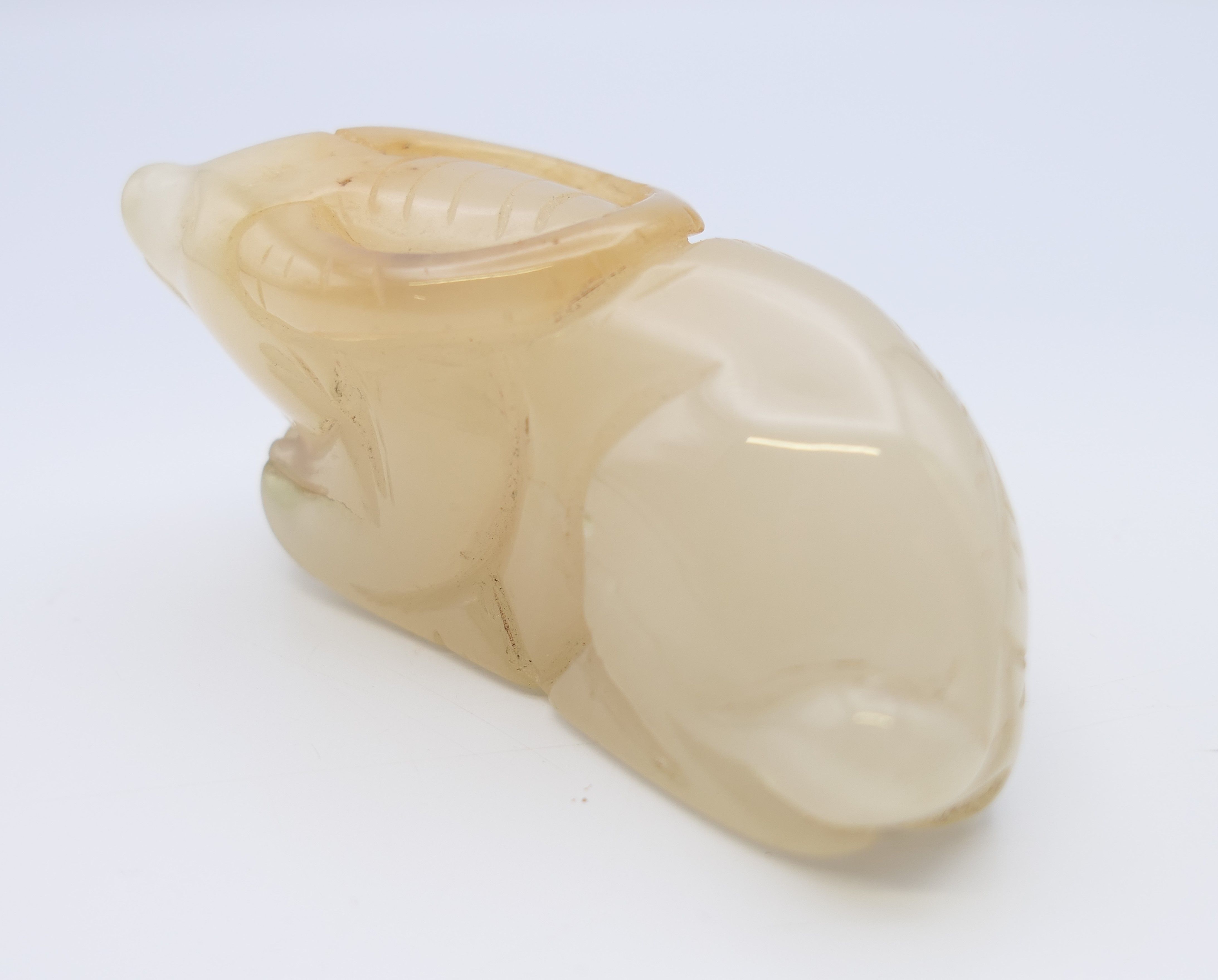 A Chinese white jade recumbent water buffalo, late Qing Dynasty or after. 7 cm long. - Image 5 of 6