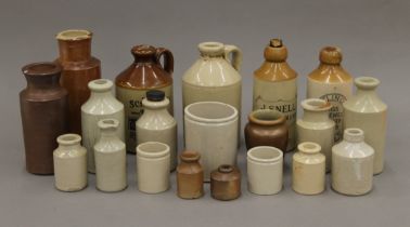 A collection of vintage stoneware bottles.
