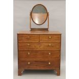 An Edwardian mahogany dressing chest. 109 cm wide.