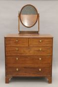 An Edwardian mahogany dressing chest. 109 cm wide.