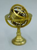 A brass astral globe. 19 cm high.
