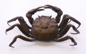 A bronze model of a crab. 15 cm wide.