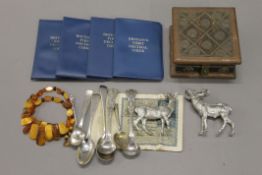 A box of miscellaneous items including coins, etc.