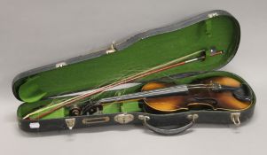A cased violin and bow. The violin 55 cm long.