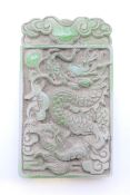 A carved jade tablet. 9 cm x 5 cm.