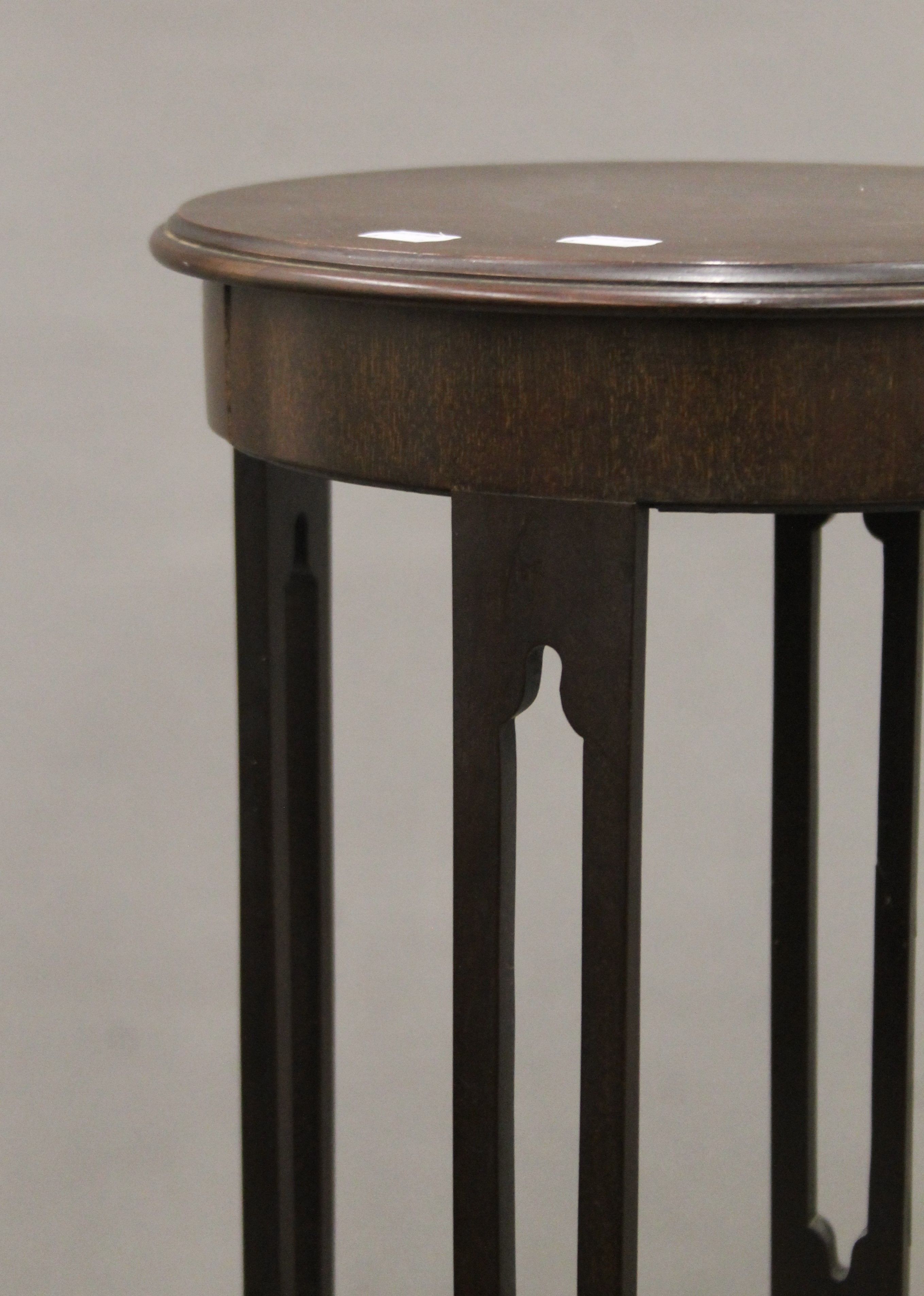 An Edwardian mahogany four tier circular jardiniere stand with pierced supports. 116 cm high. - Image 3 of 4