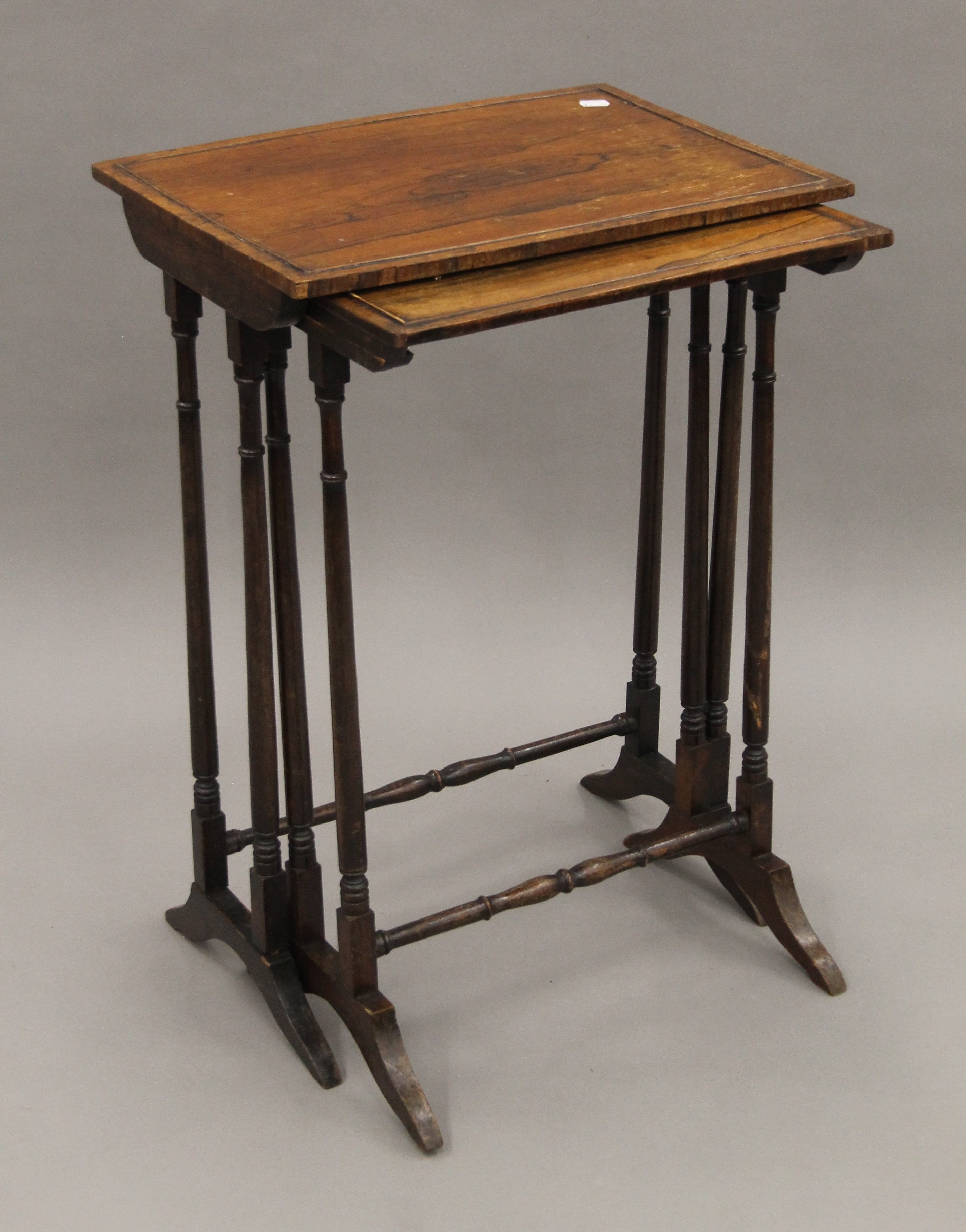 A 19th century nest of two rosewood tables. The largest 50 cm wide. - Image 2 of 5