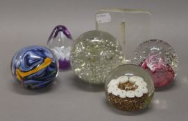 A quantity of paperweights.