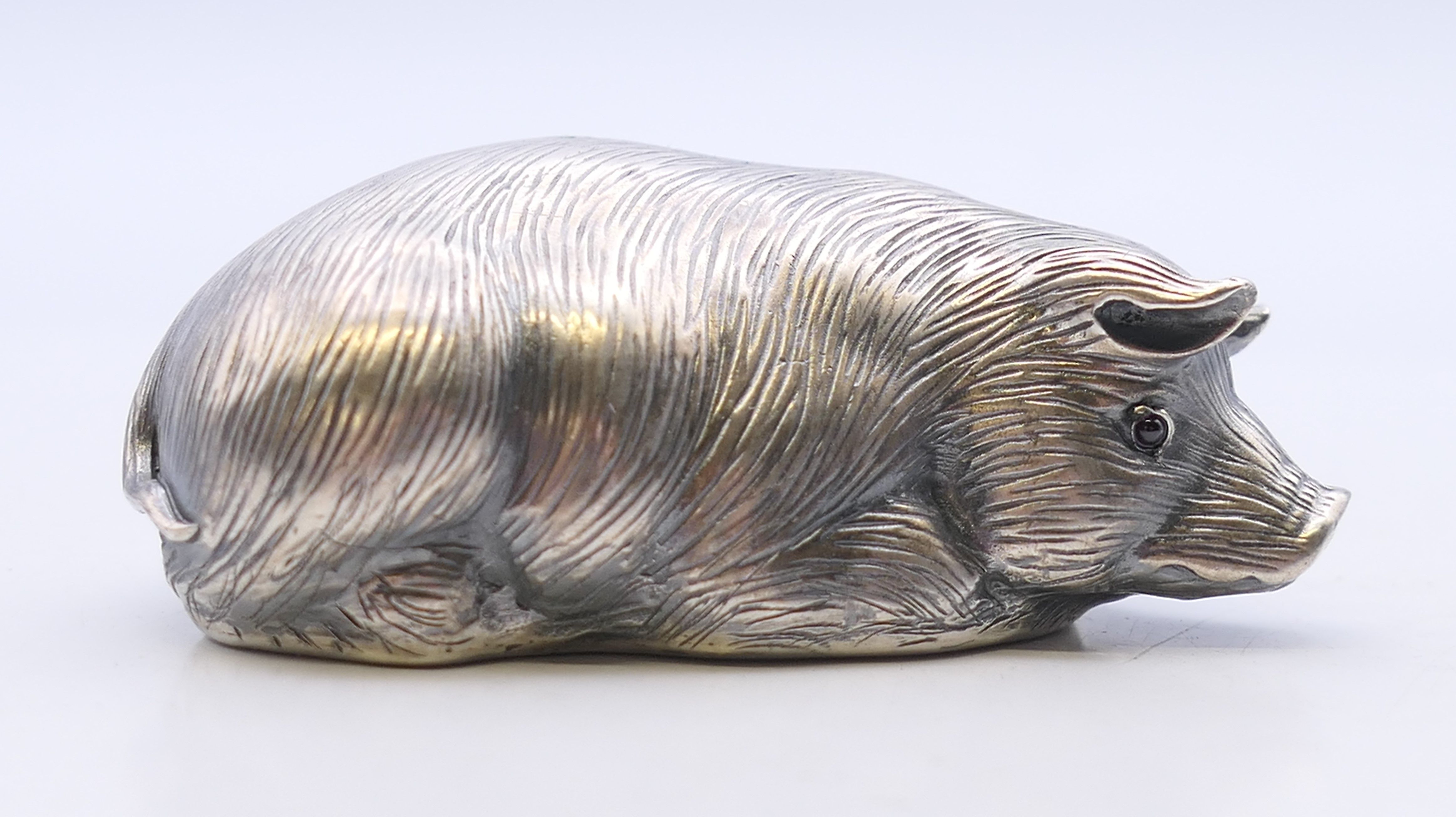 A silver model of a pig, bearing Russian marks. 6 cm long. 29.9 grammes total weight.