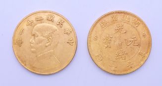 Two Chinese coins. Each 4.5 cm diameter.