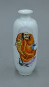 A small Chinese Republic Period porcelain vase decorated with an immortal. 14 cm high.