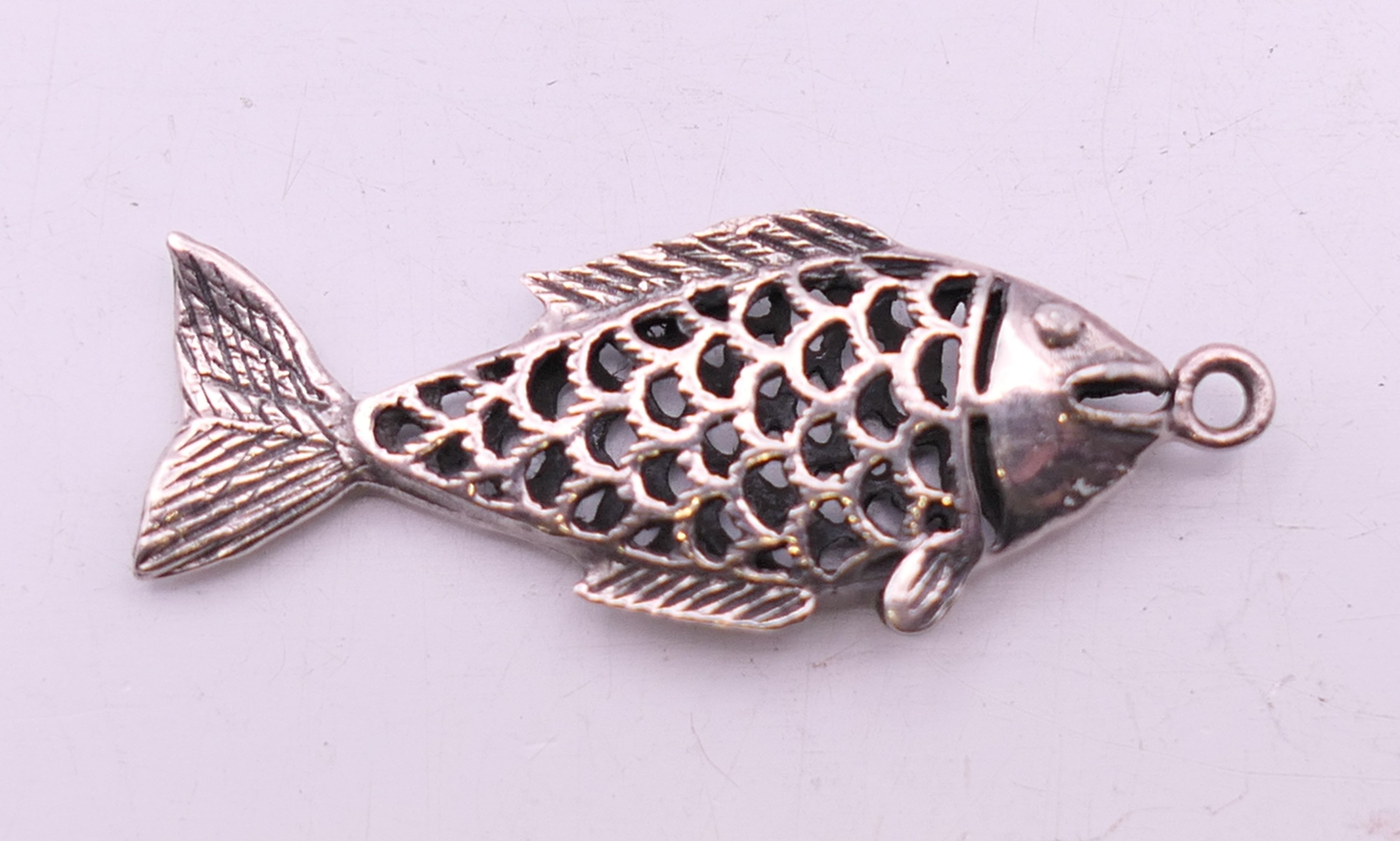 Five silver pendants. Fish form pendant 3.5 cm high. - Image 2 of 7