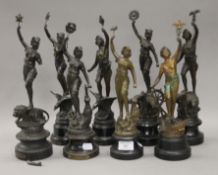 A collection of spelter figures, including two pairs of figures. The largest 34.5 cm high.