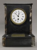 A Victorian marble mantle clock bearing presentation plaque, inscribed ''1889 Q.O.