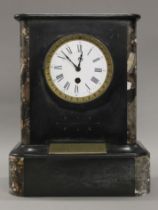 A Victorian marble mantle clock bearing presentation plaque, inscribed ''1889 Q.O.