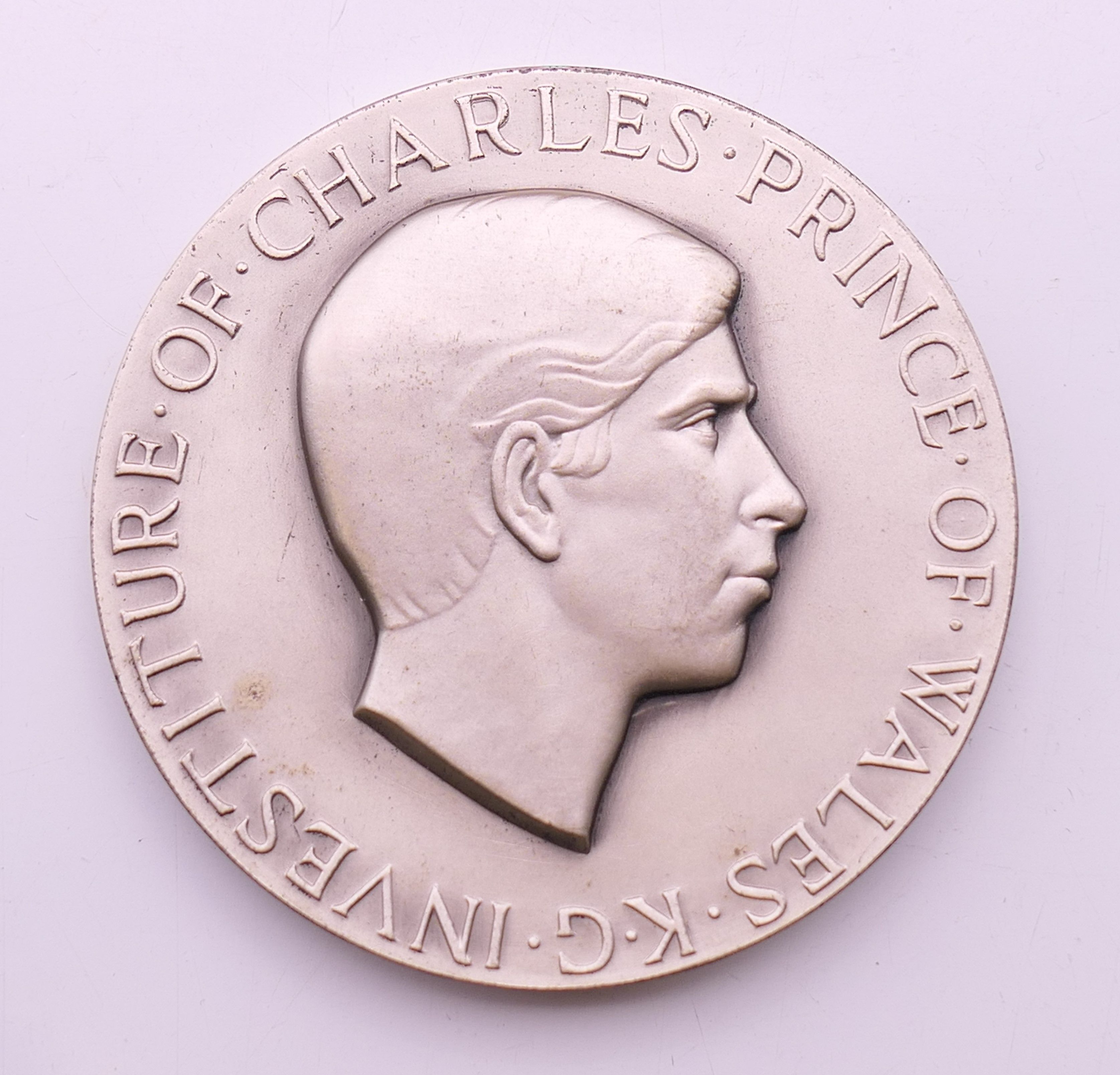 A cased set of hallmarked silver Britannia coins -Commemorative Medal of the Investiture of Prince - Image 4 of 6