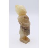 A Chinese jade standing male figure, hands clasped at waist, Han Dynasty. 7 cm high.