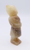 A Chinese jade standing male figure, hands clasped at waist, Han Dynasty. 7 cm high.