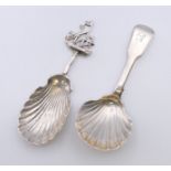 Two silver caddy spoons. Each 10 cm long. 33.6 grammes.