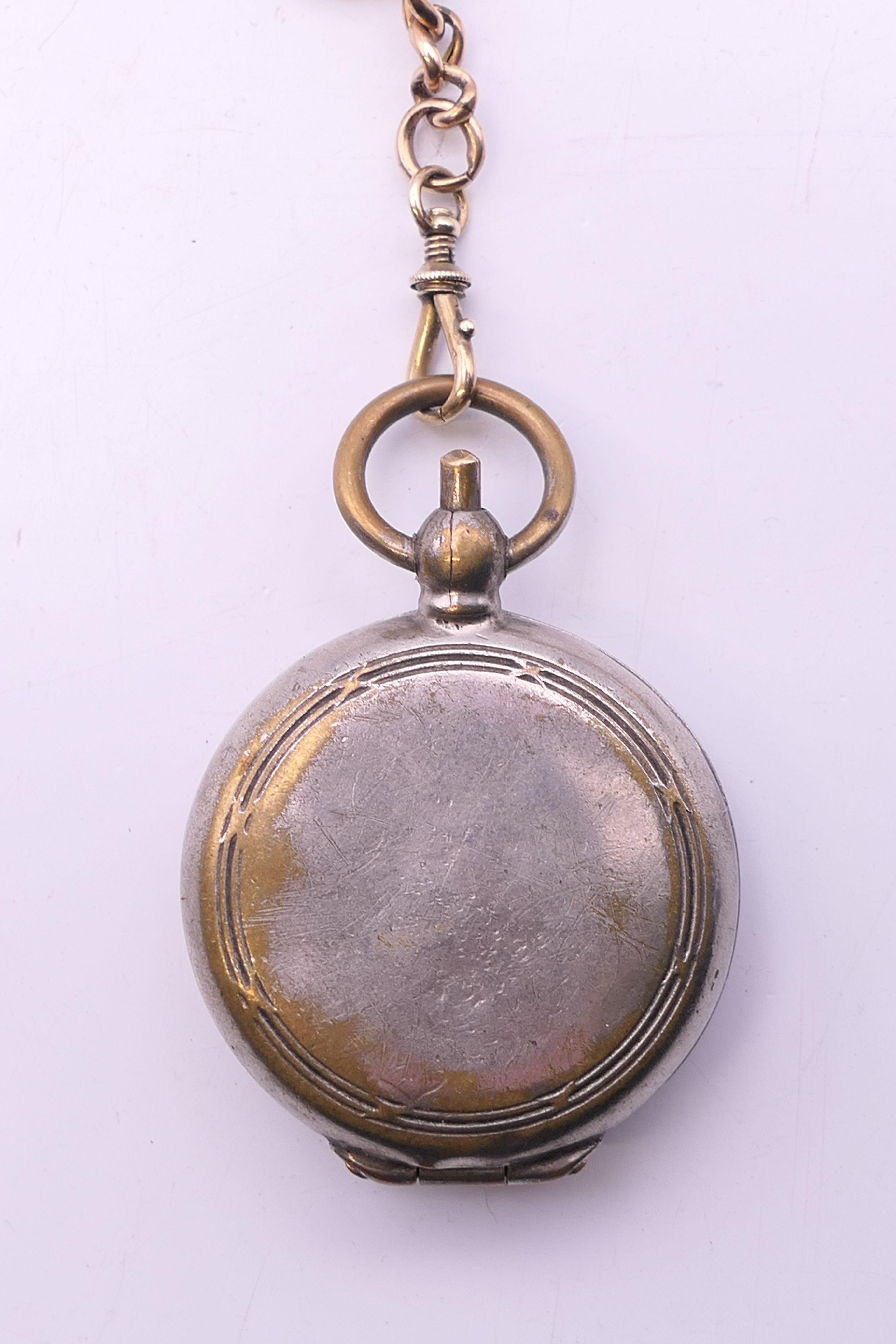 A 9 ct gold pocket watch on a 9 ct gold chain. 4.75 cm diameter, chain 35 cm long. The watch 78. - Image 13 of 17