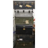 A quantity of travelling trunks, including military examples. The largest 91 cm wide.