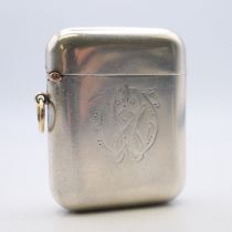 A silver vesta case with 9 ct gold mounts, hallmarked for Chester 1908,