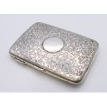 A silver card case, hallmarked for Birmingham 1899, maker's mark of L & Co. 10.5 cm x 7.5 cm. 107.