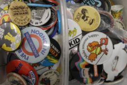 A collection of vintage badges.