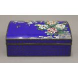 An early 20th century Japanese sky blue ground cloisonne box with domed lid decorated with flowers,