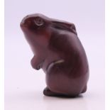 A netsuke formed as a rabbit. 5 cm high.