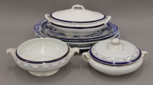 A quantity of blue and white porcelain meat plates and tureens.