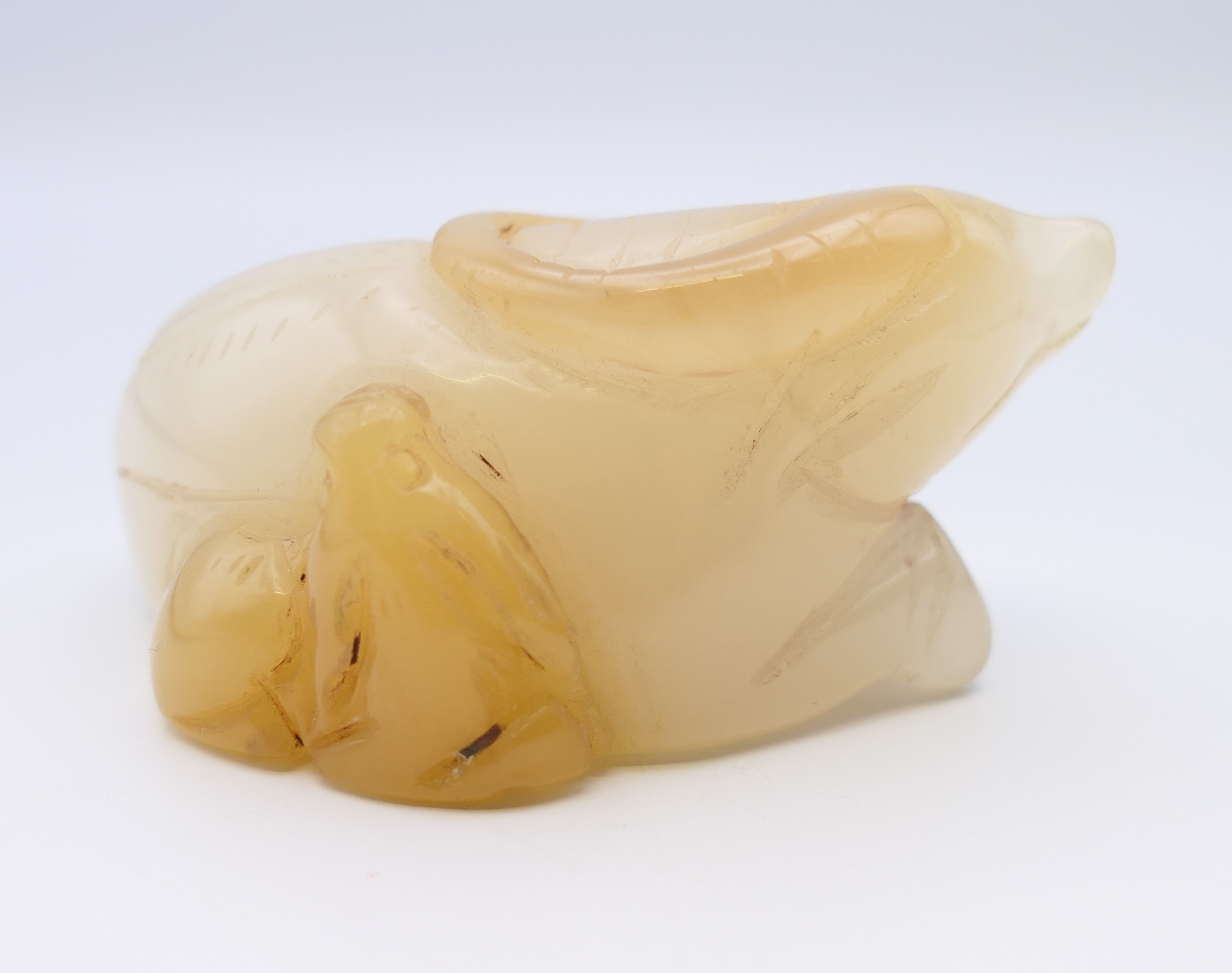 A Chinese white jade recumbent water buffalo, late Qing Dynasty or after. 7 cm long. - Image 2 of 6