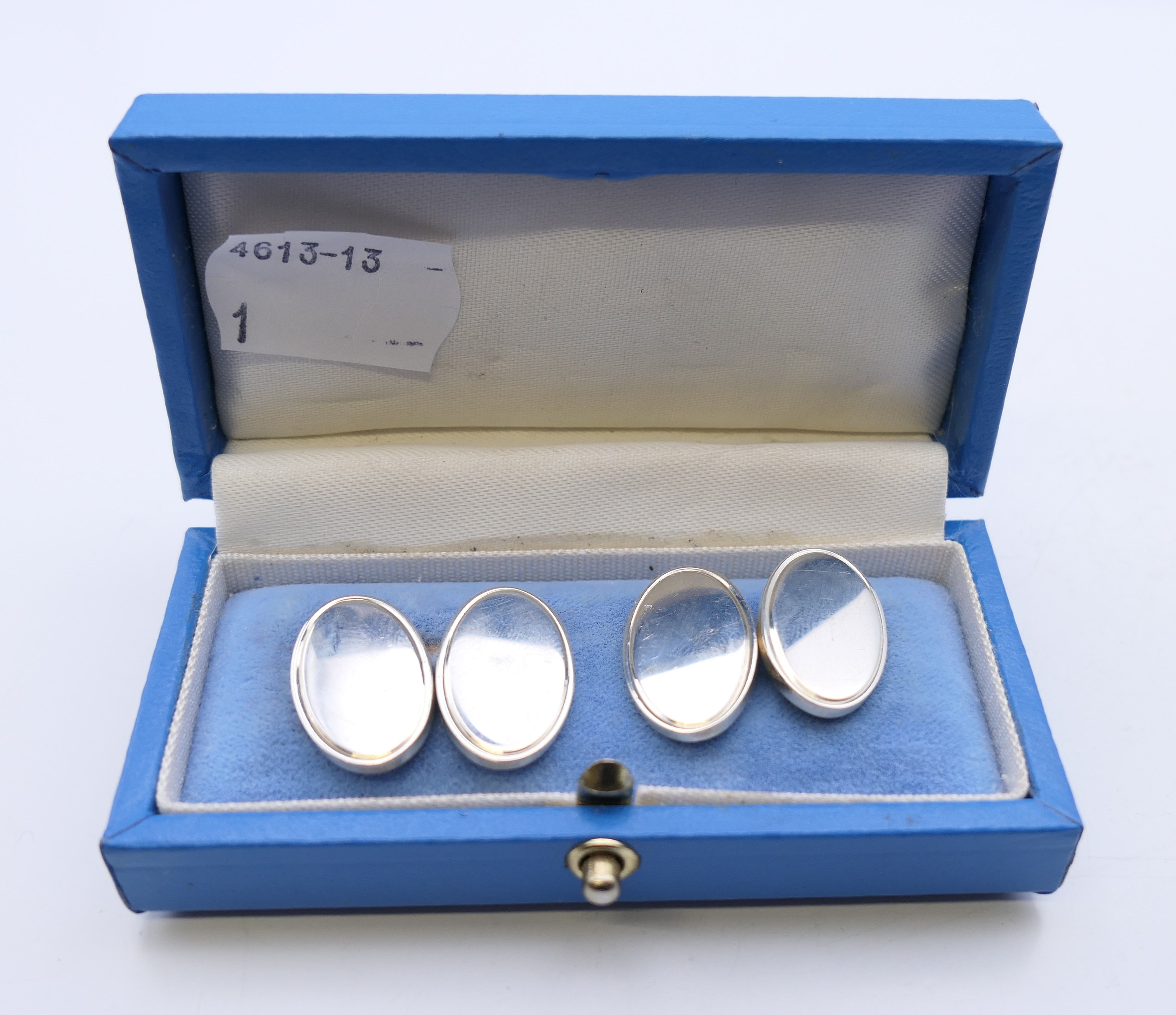 A pair of Garrard & Co silver cufflinks, in a Garrard's box. 2 cm x 1.5 cm. - Image 5 of 6
