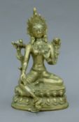 A silvered brass model of Buddha. 22 cm high.
