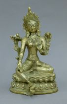 A silvered brass model of Buddha. 22 cm high.