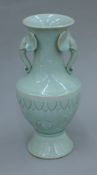 A Korean green ground porcelain vase. 25.5 cm high.